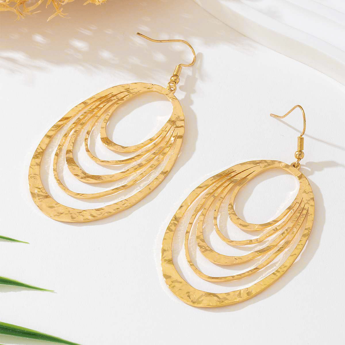 Golden Cascade Earrings - Multi-Layer Teardrop Earrings with Concentric Hoop Design