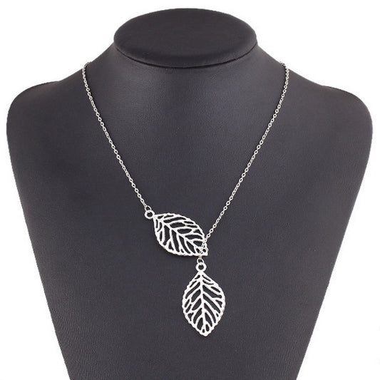 Double Leaf Pull-Thru Necklace on jewelry stand