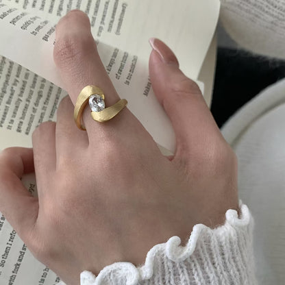 Contemporary Twist Ring - Brushed Gold Geometric Ring with Crystal Stone