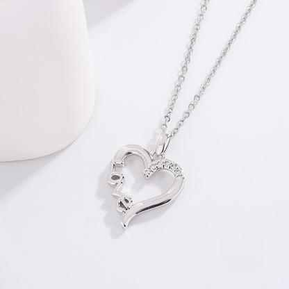 "Love" Heart Necklace - Silver Heart Pendant with Crystal Accent