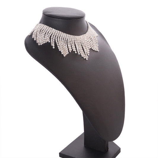 diamond tassel necklace on necklace display