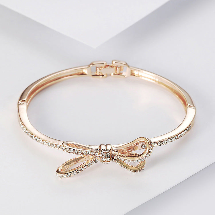 Crystal Bow Bangle Bracelet - Rose Gold Hinged Cuff with Sparkling Ribbon Design