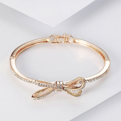 Crystal Bow Bangle Bracelet - Rose Gold Hinged Cuff with Sparkling Ribbon Design