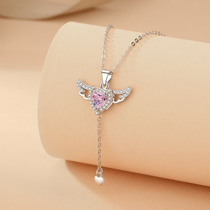 Angel Wing Fluttering Heart Necklace - Silver Cupid Pendant with Pink Crystal and Pearl Drop