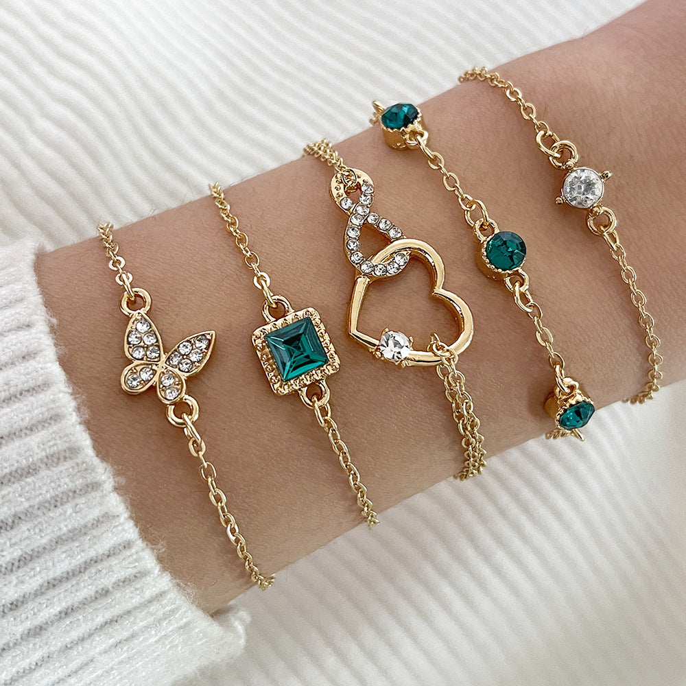 Layered Charm Bracelet Set - 5-Piece Delicate Chain Bracelets with Emerald Green Crystals in Gold or Silver