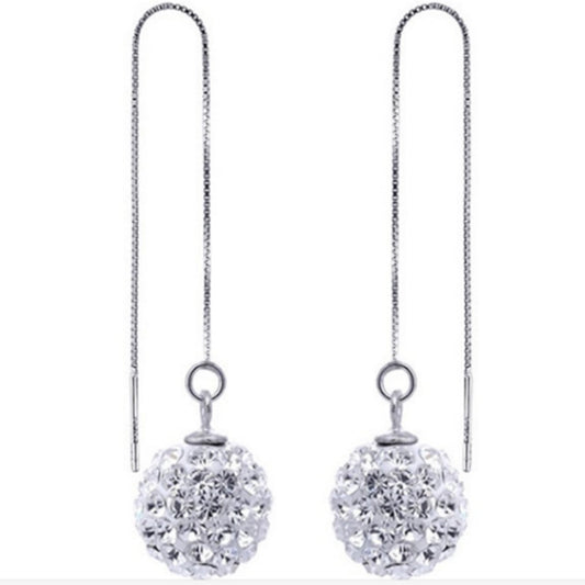 crystal pull through earrings on white background