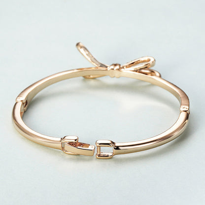 Crystal Bow Bangle Bracelet - Rose Gold Hinged Cuff with Sparkling Ribbon Design