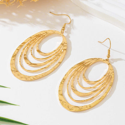 Golden Cascade Earrings - Multi-Layer Teardrop Earrings with Concentric Hoop Design