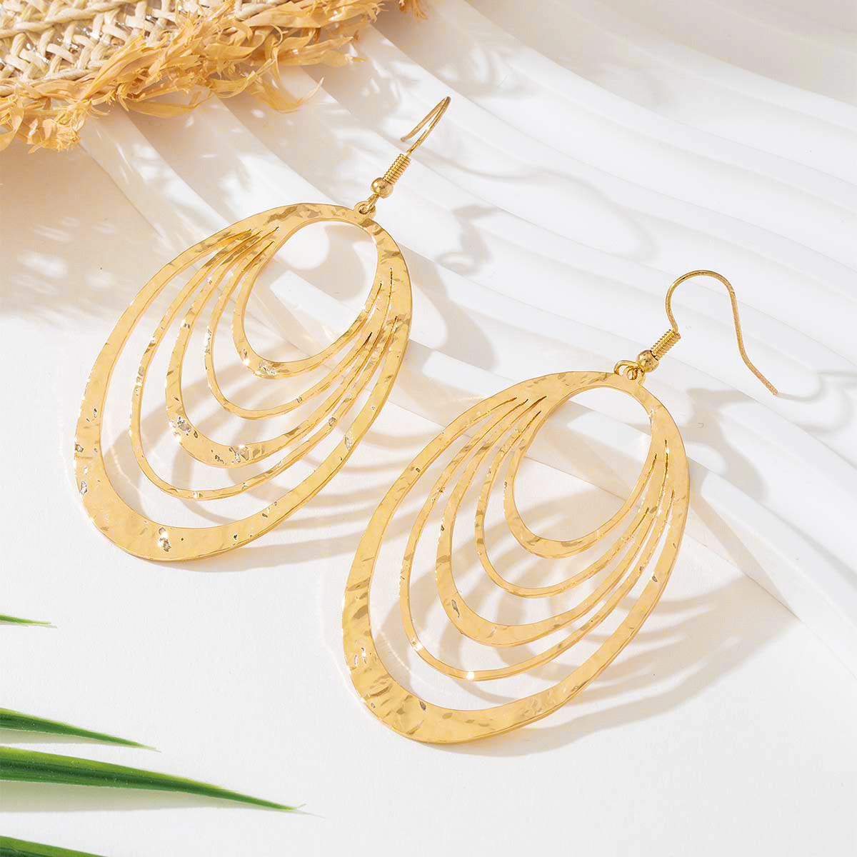 Golden Cascade Earrings - Multi-Layer Teardrop Earrings with Concentric Hoop Design