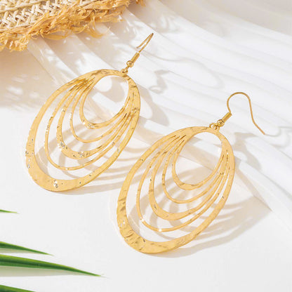 Golden Cascade Earrings - Multi-Layer Teardrop Earrings with Concentric Hoop Design